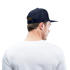 90 minuten lang. Zwarte letters. Trucker Cap - wit/navy